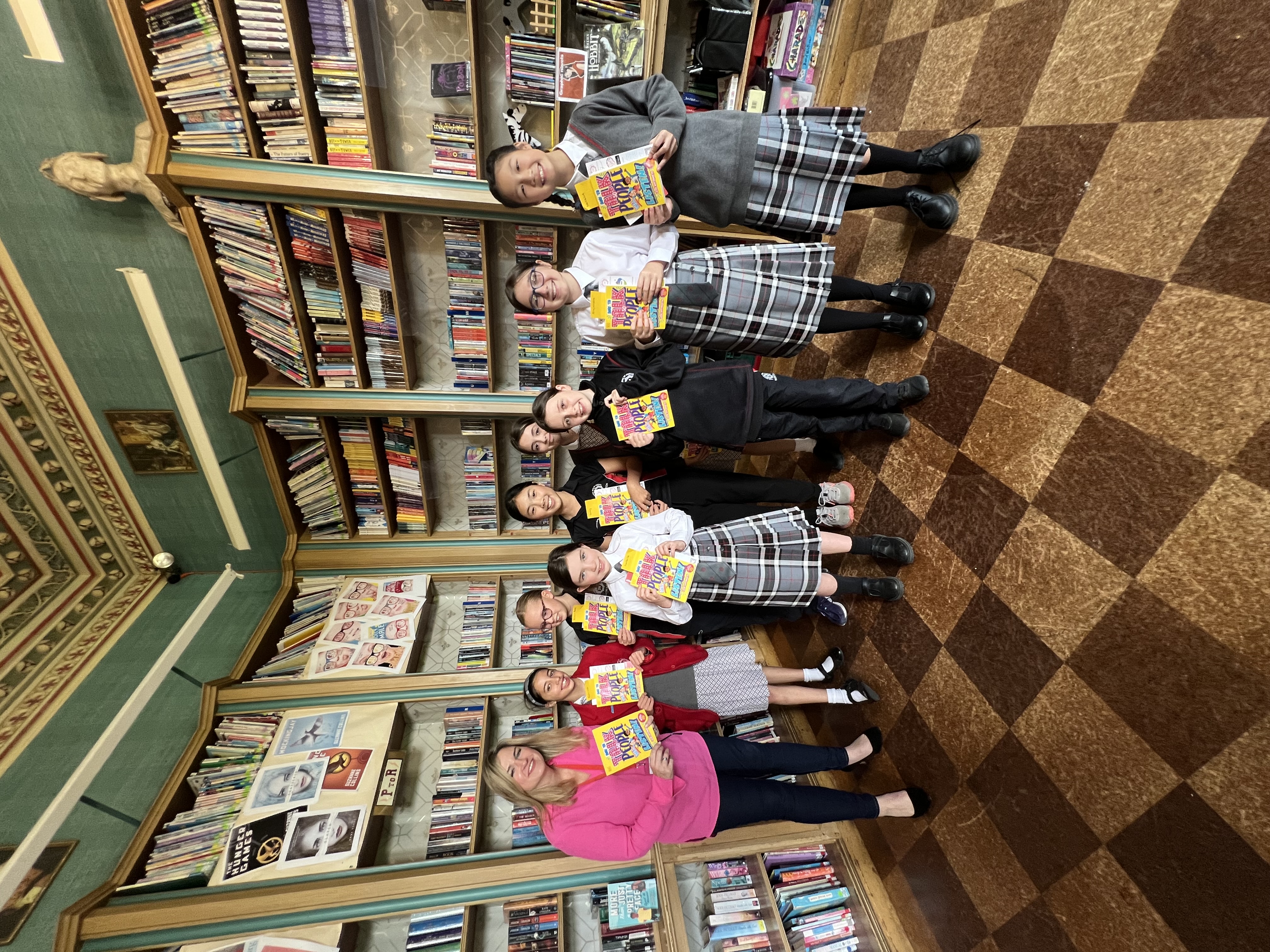 ThorntonStudentswithLizzieWaterworthinLibrarywithbooks.jpeg