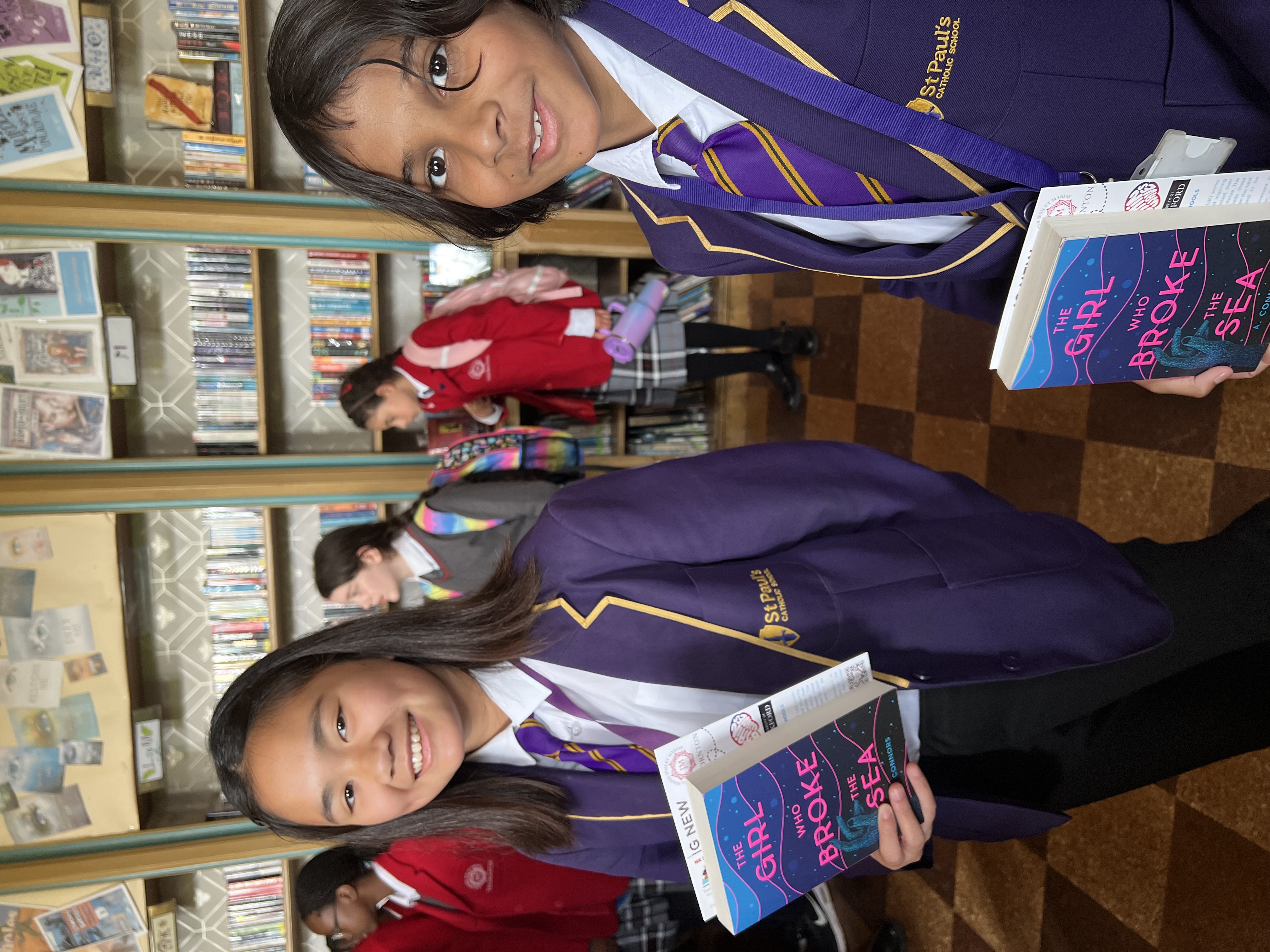 StPaulsStudentswithBooksinLibrary.jpeg